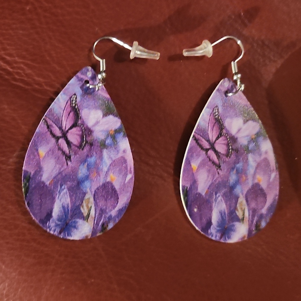 2" long earrings. Purple
